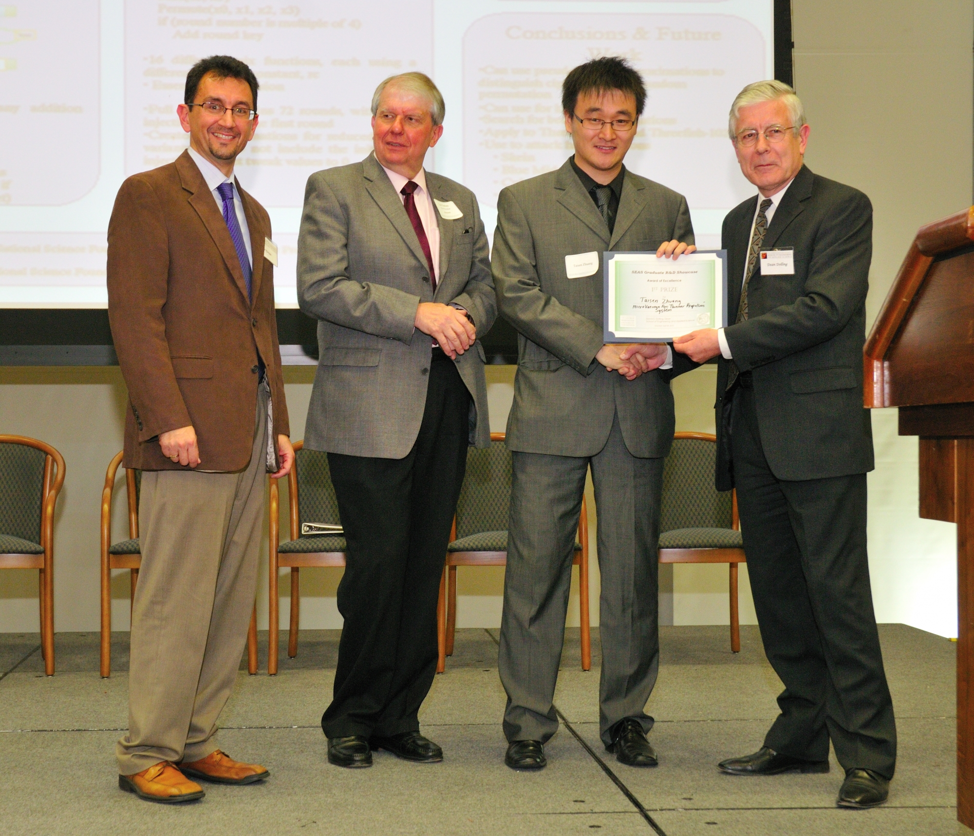 Taisen Zhuang posing with award